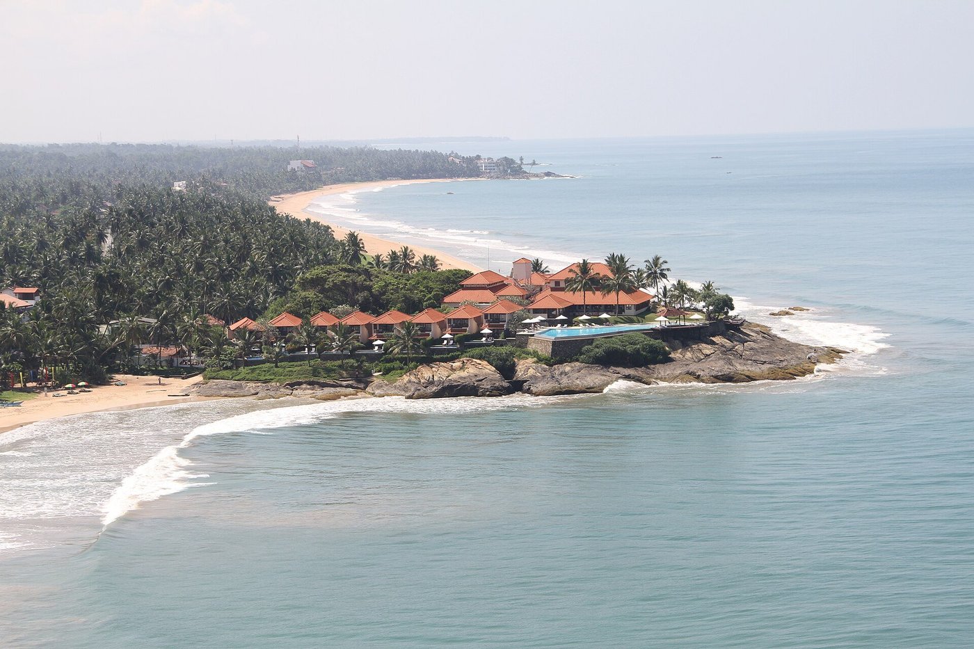 Aerial view of a beachfront resort on Bentota's rocky coastline