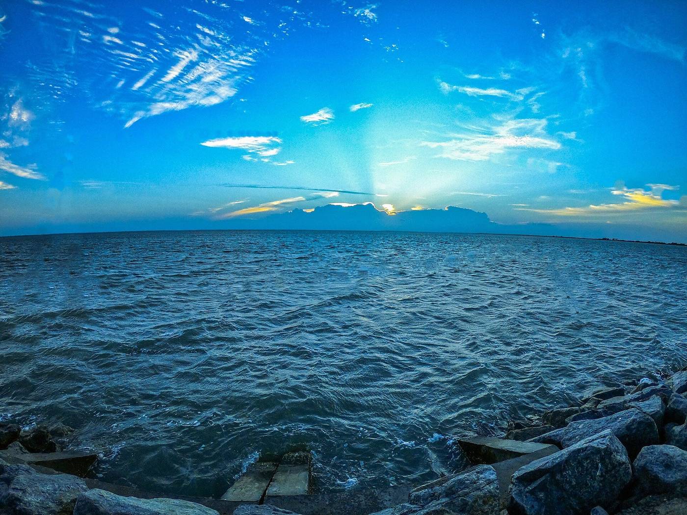 Sunset over Jaffna's lagoon at Sangupiddy Bridge
