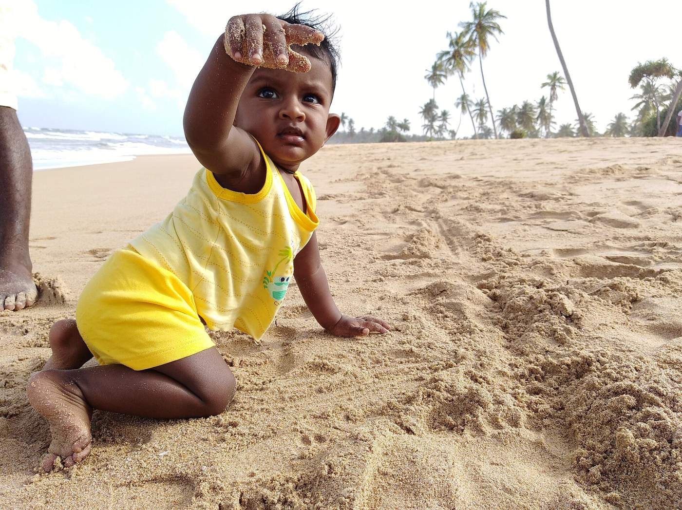The long, quiet shoreline of Nilaveli Beach