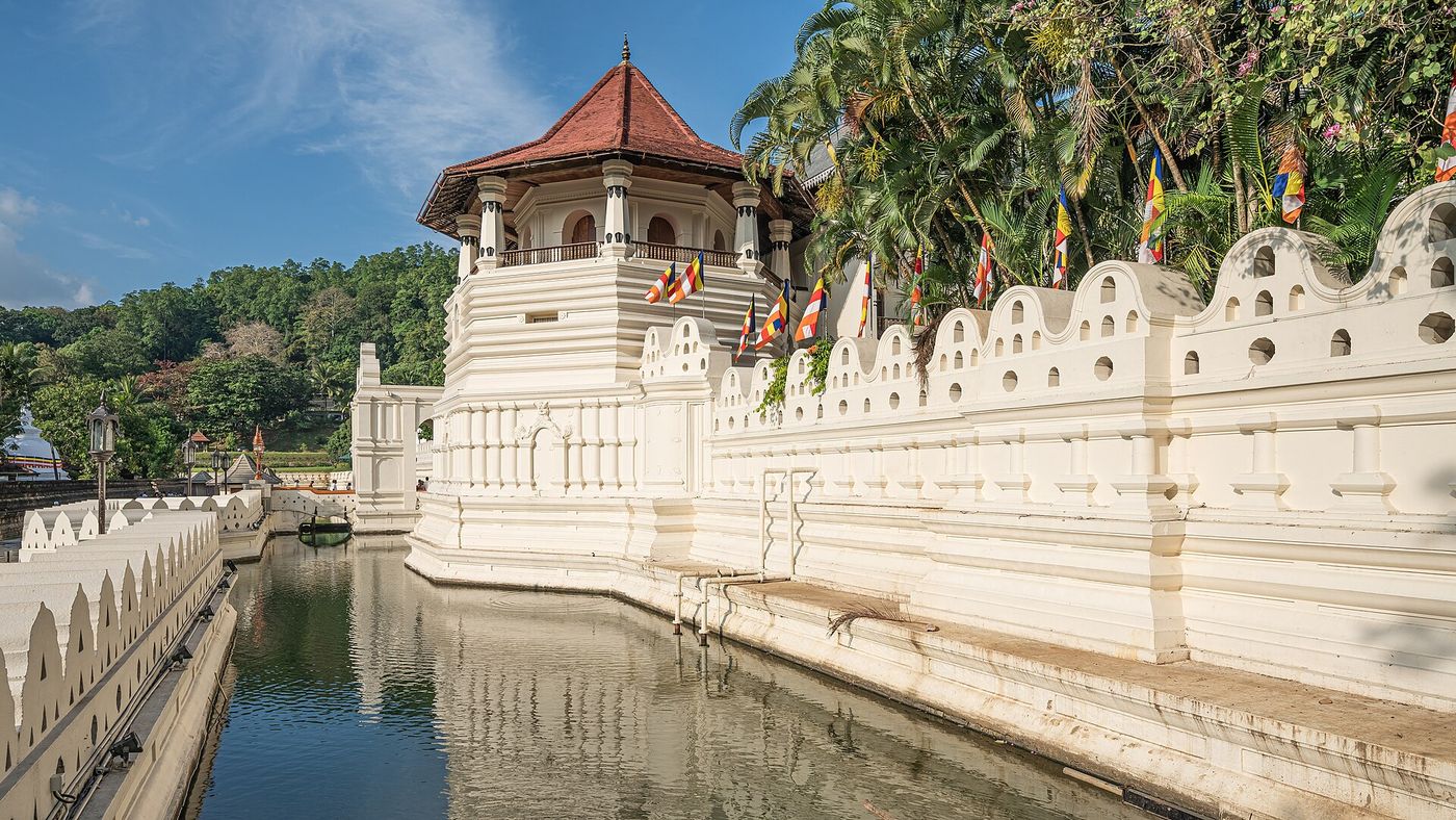 Temple of the Sacred Tooth Relic beside the moat, Kandy