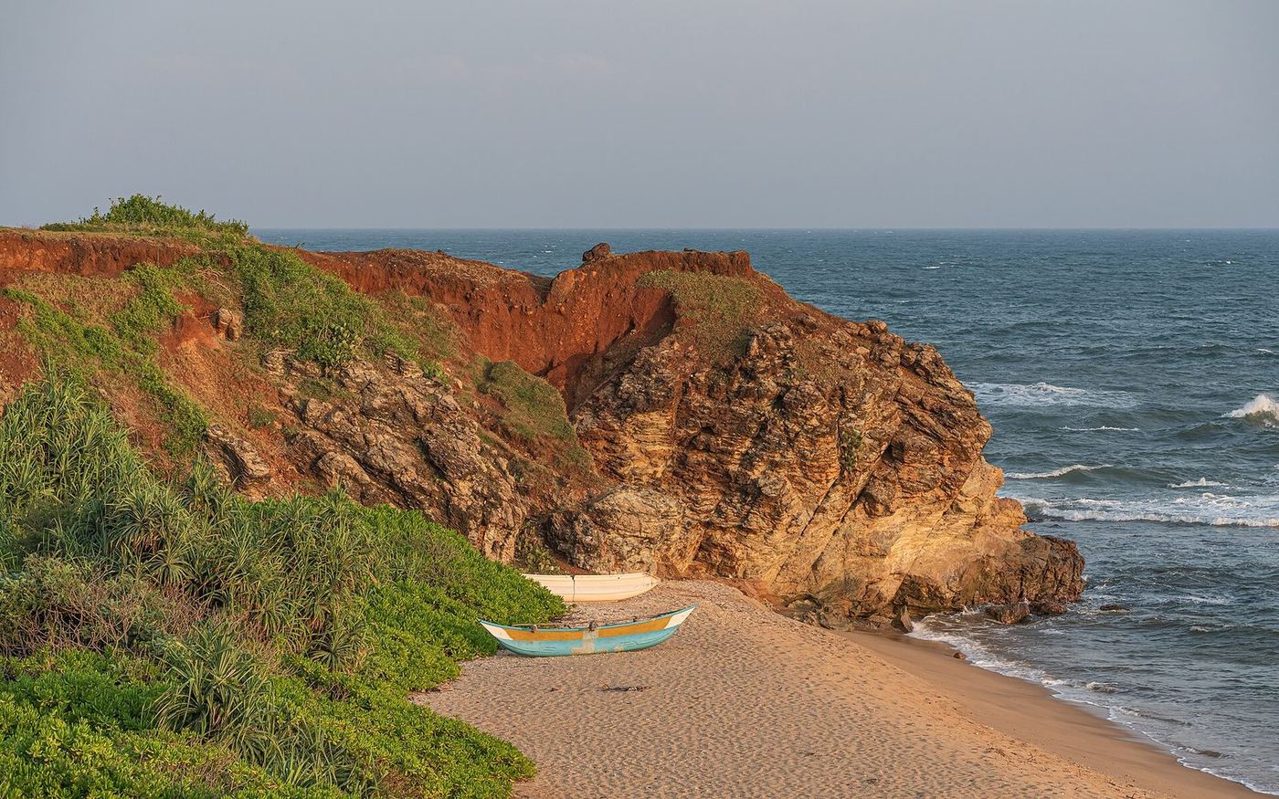 Red cliffs above the beach at Ussangoda